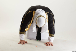 Arthur Fuller Sultan Bowing bowing kneeling whole body 0001.jpg
